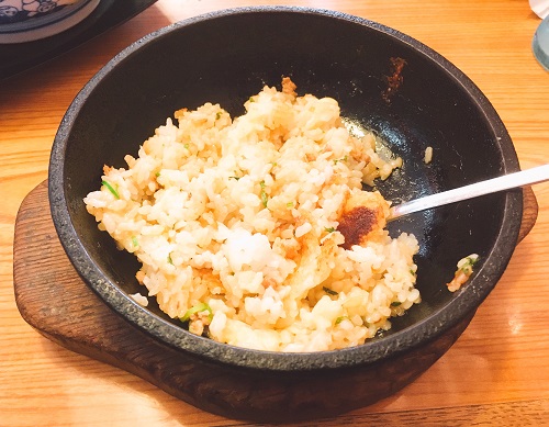 リゾット用ご飯にタンタン麺のスープを入れた写真